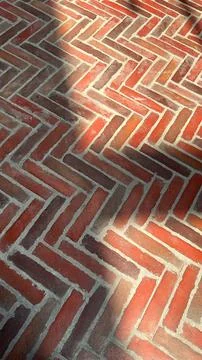 Interlocking brick pattern creates geometric visual flow combining clean lines Stock Photos