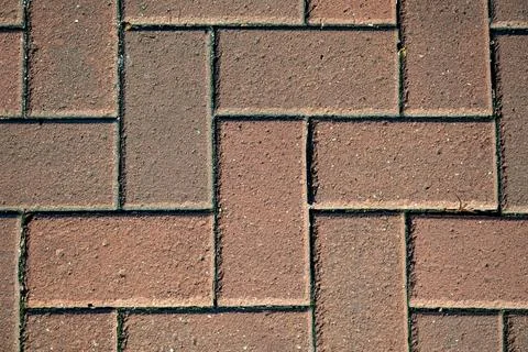 Interlocking brick paver pattern texture background Stock Photos
