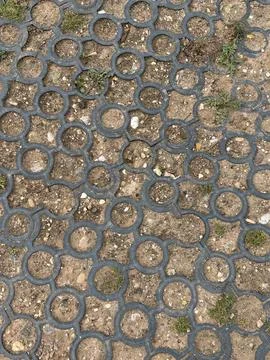 Interlocking Circle Paver Ground Cover Tiles Over Dirt Surface Stock Photos