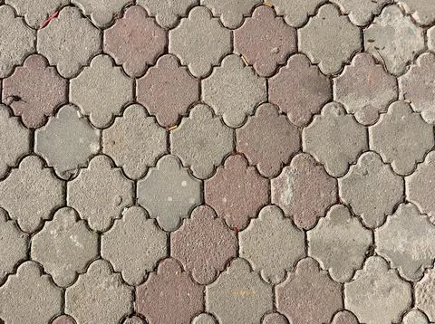 Interlocking Concrete Pavement with Geometric Pattern Stock Photos