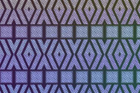 Interlocking diamond and arrow motifs form a complex geometric pattern with Stock Illustration