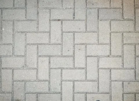 Interlocking floor made of rectangular concrete blocks Stock Photos