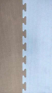 Interlocking Foam Mat Texture - Brown and Light Blue Stock Photos