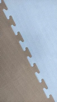 Interlocking Foam Mat Texture - Brown and Light Blue Stock Photos