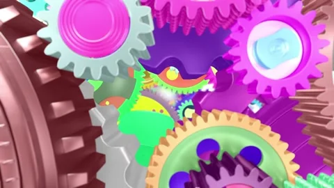 Interlocking gears and cogs spin together, forming a perfectly functioning .. 動画素材 267991065