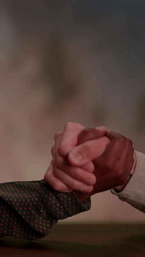 Interlocking Hands as a Powerful Symbol for Unity, Togetherness, and Stock Footage 295225639