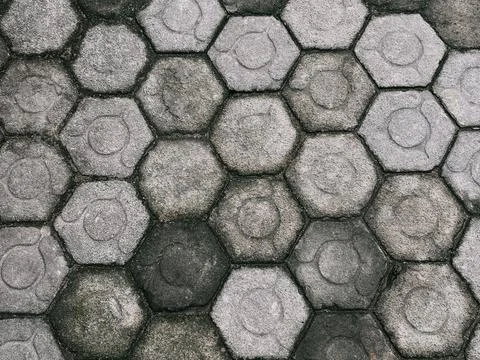Interlocking hexagonal paving stone tiles pattern Stock Photos