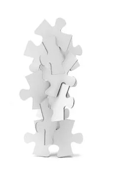Interlocking pieces of jigsaw puzzles tower Stock Photos