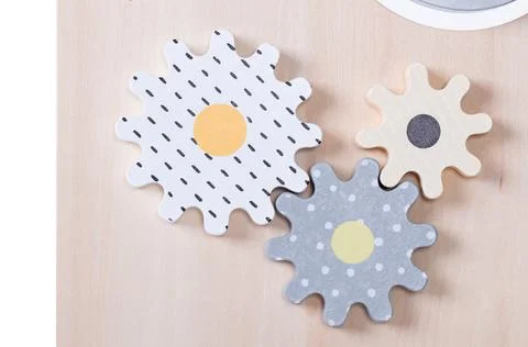 Interlocking wooden gears on a childrens toy Stock Photos