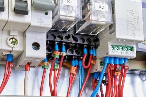Intermediate electrical relays, circuit breakers in electrical Cabinet. Stock Photos