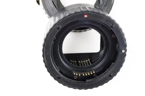 Intermediate ring for macro photography on a white table. Photo accessories f Stock Photos