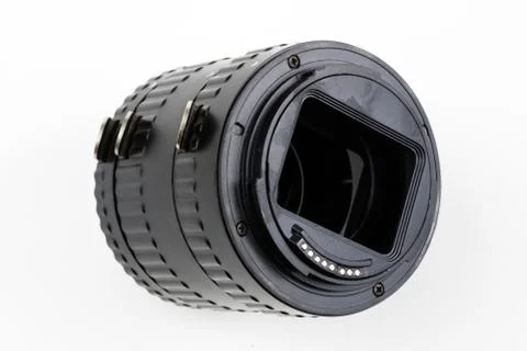 Intermediate ring for macro photography on a white table. Photo accessories f Stock Photos
