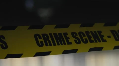 Intermittent Flash light illuminates Police Crime scene reflective tape 動画素材 311803065