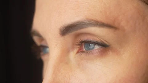 Intermittent flashes of fire engine siren and strobe light on female face. Adult Video stock 268790844