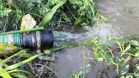 Intermittent Low Water Flow from Pump Pipe Showing Reduced Pressure Stock Footage 327793812