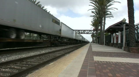 Intermodal Freight Train Passes Thru Station 스톡 동영상 750059