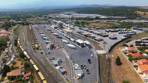 Intermodal logistics hub, showing the transition zone between heavy freight Stock Footage 336776851
