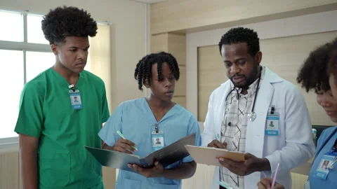 Intern or medical student talking to medical lecturer. Stock Footage 182000244