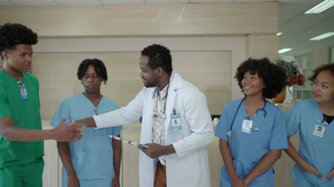 Intern or medical student talking to medical lecturer. Stock Footage 182000755