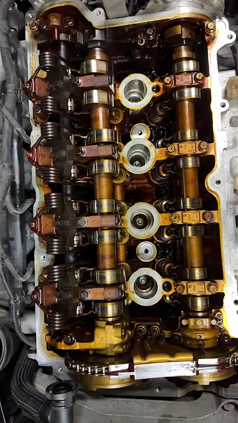 Internal combustion engine camshaft and valve system in slow motion Stock Footage 314236567