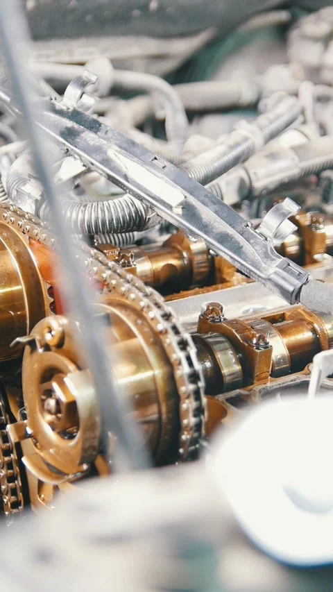 The internal combustion engine, repair at car service, details under the hood of Stock Footage 336306098