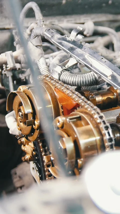 The internal combustion engine, repair at car service, details under the hood of Stock Footage 336306132