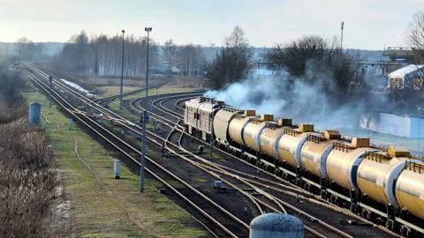 Internal combustion Locomotive engine on rail thick pollution smoke Stock Footage 265256830