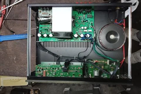 Internal Components of an Audio Amplifier Showing Circuit Boards and Wiring Stock Photos