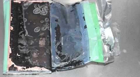 Internal components of a damaged Lithium battery, also called spicy pillow .. Stock Photos