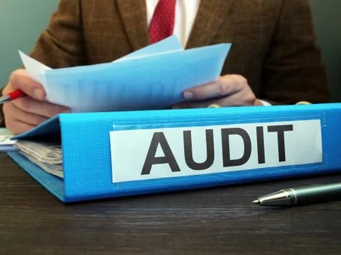 Internal financial audit. Auditor with folder and papers. Stock Photos