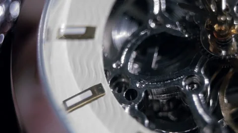 Internal gears of a watch in slow motion, macro Stock Footage 39608575