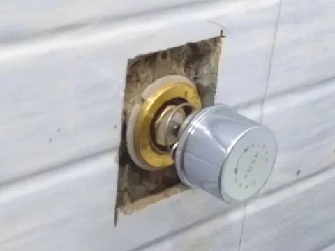 Internal mechanism of the flush button Stock Photos