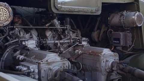 Internal parts and the engine of an old military tractor Stock Footage 213727002