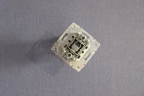Internal parts of the electrical switch. Installation of electrical switches. 库存照片
