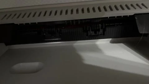 Internal printer rollers rotating in close up, office printing mechanism and Stock Footage 337118072