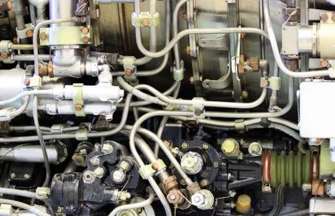 The internal structure of the aircraft engine, with hydraulic, fuel pipes and Stock Photos