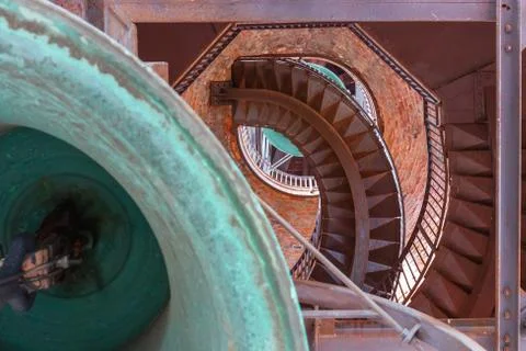 Internal structure of the bell tower with stairs and bell Stock Photos