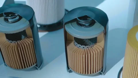 The internal structure of new fuel and oil filters for truck engines Stock Footage 340459467