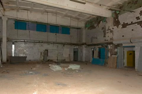 Internal terrible premises of the destroyed and abandoned building of the bak Stock Photos