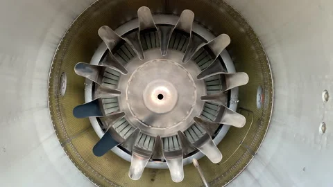 Internal View Jet Engine Exhaust with Spinning Turbine Blade and Mixer Stock Footage