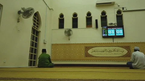 Internal view of a local mosque (masjid) during evening prayer  in Malaysia. Stock Footage 105371418