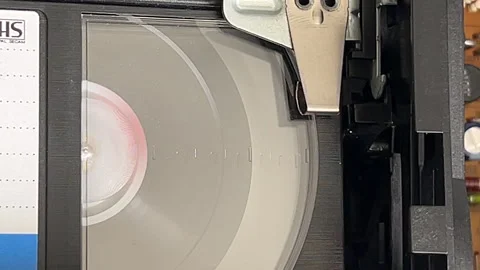 Internal view of VHS cassette rewinding Stock Footage 316820033