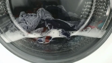 Internal view of a washing machine drum. Close-up Видео 72476516