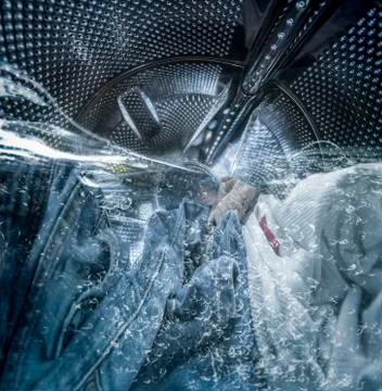 Internal view of a washing machine drum during wash Stock Photos