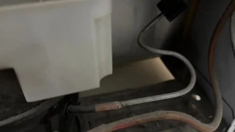 Internal wiring and electronic components inside appliance in close up, Stock Footage 337116860
