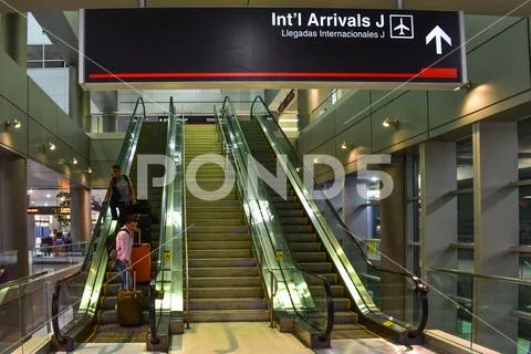 International Arrivals J sign at Miami International Airport Stock Photos