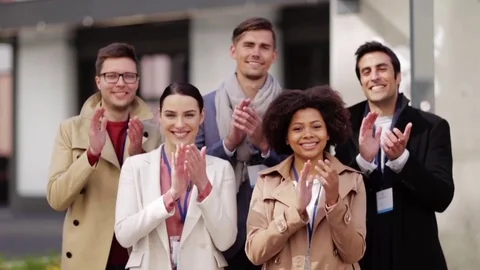 International business team name tags applauding Stock Footage