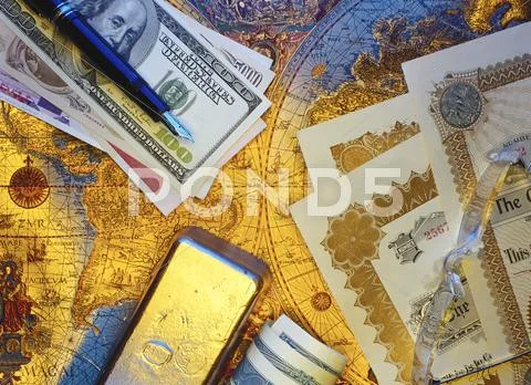 International Currency, Pen Stock Certificates And Gold Bar On Antique World Map