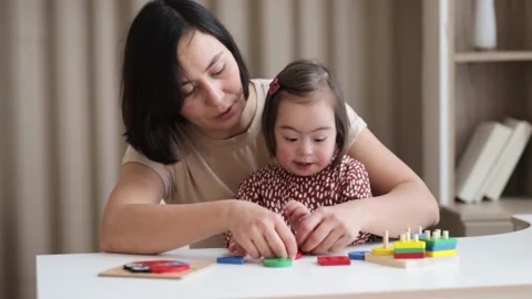 International Down Syndrome Day, March 21, care for the health and learning o Stock Footage