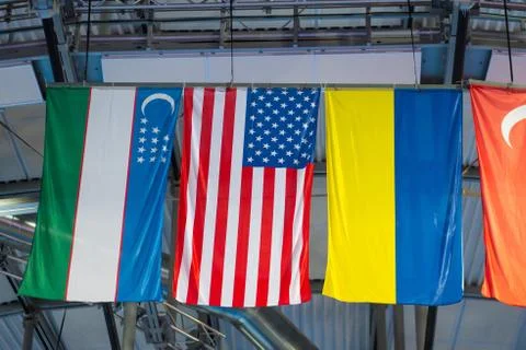 International flags on the Olympic arena. Flags of different countries at spo Stock Photos